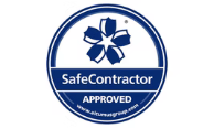 a blue circle logo with a half circle of white within it that contains a blue ribbon with a star in it, under that it says 'Safe Contractor Approved'.