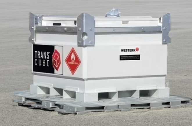 A white fuel storage tank, which is shaped like a cube, on the front it has the 'Western' logo on it, and on the side it has a flammable warning and the name of the product 'TransCube' on it in white with a black square around it.
