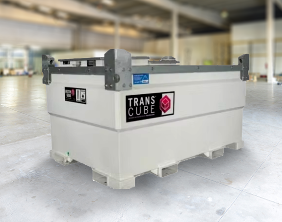 A white fuel storage tank, which is shaped like a cube, on the back it has some warning labels on it, and on the side it has the name of the product 'TransCube' on it in white with a black square around it.