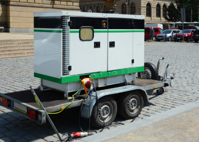 a stock image of a commercial grade white and green portable generator that's mounted on top of a trailer with two wheels.